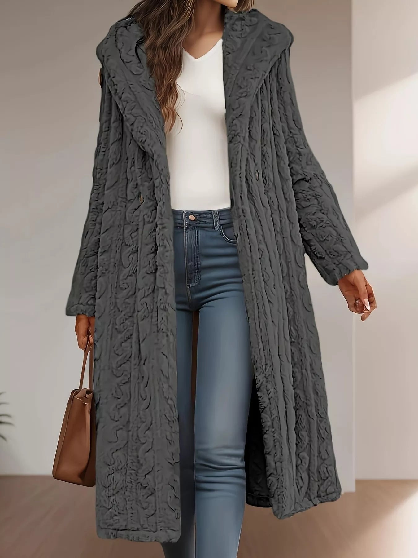 Sherpa longline hooded coat in gray, thick buttoned design, perfect for layering in colder weather, paired with casual jeans.
