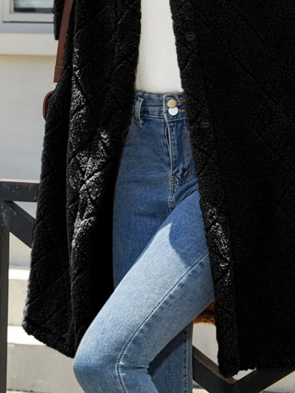 Texture button-up dropped shoulder coat worn over blue jeans and a white top, showcasing a stylish layered look.