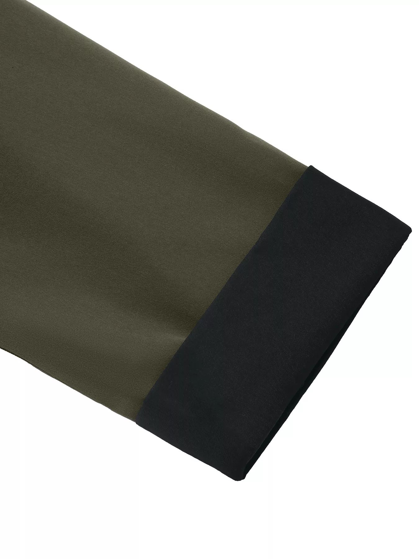Close-up of the contrast collar and cuff detail on a button-up coat in olive green and black.