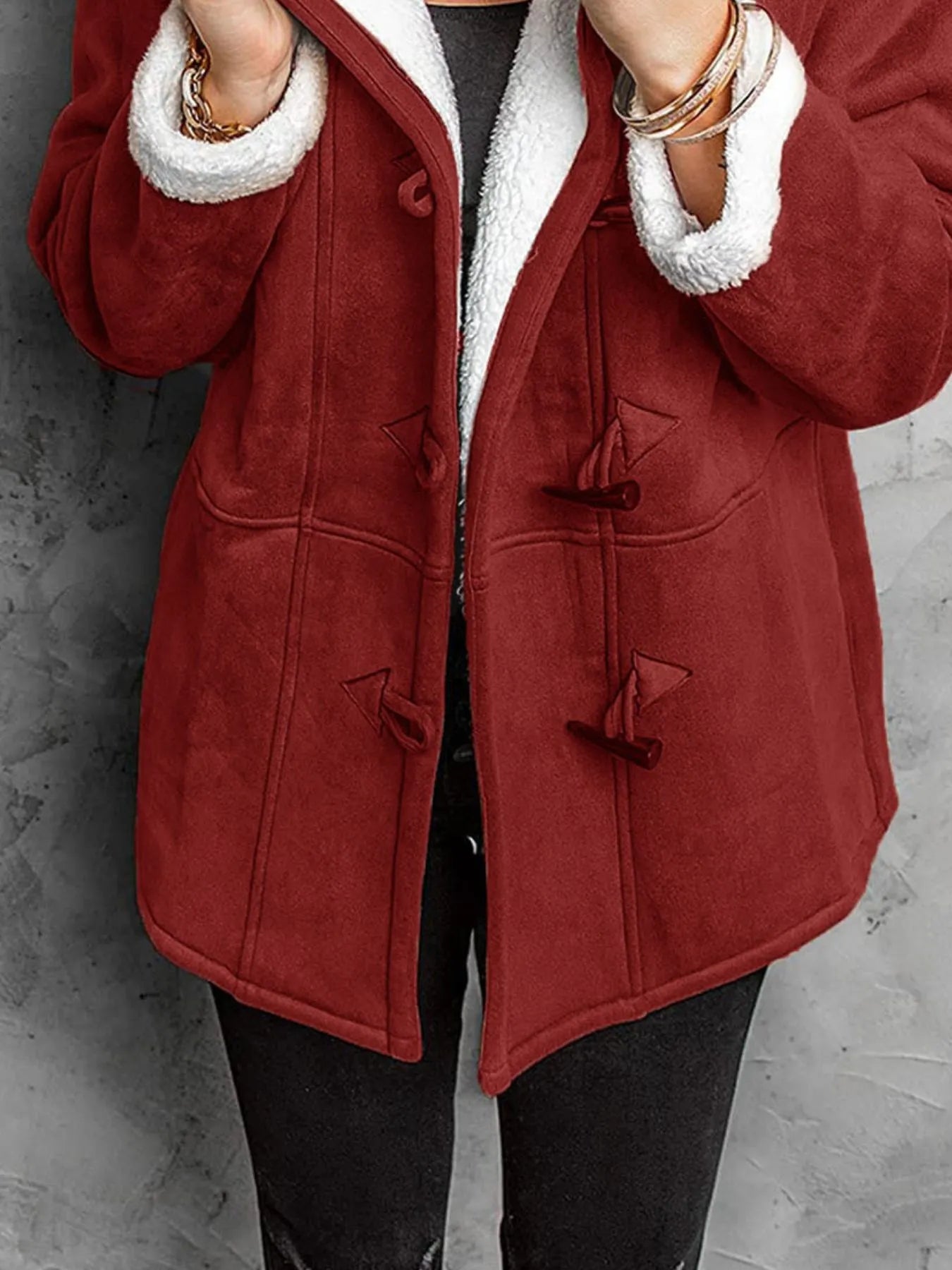 Cozy full size sherpa lined toggle coat with hood in red, featuring stylish buttons and a warm design.