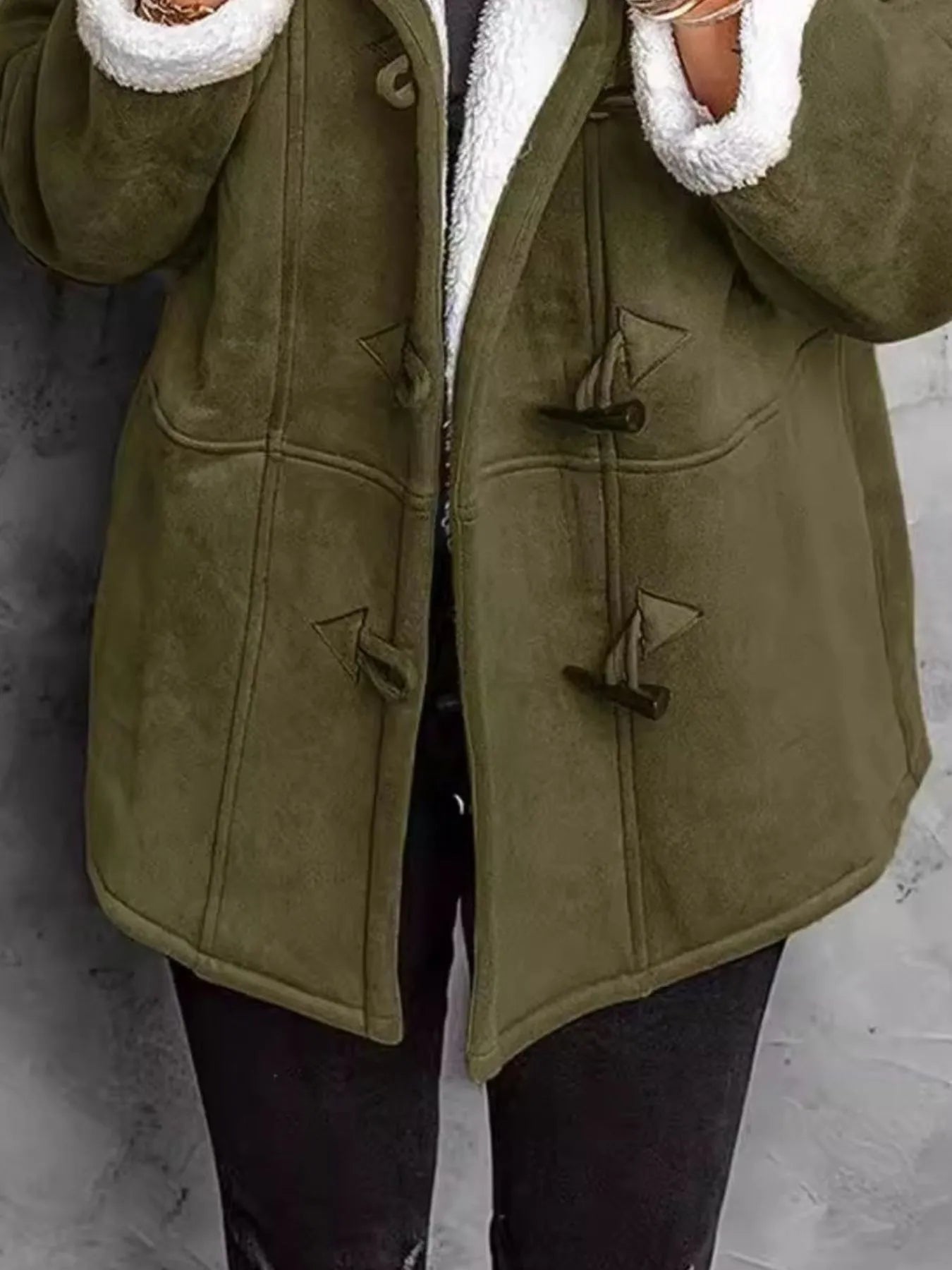 Cozy full size olive green sherpa lined toggle coat with hood, featuring buttons and pockets for style and comfort.