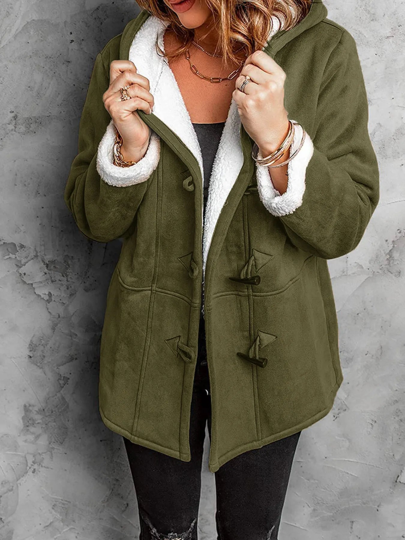 Full Size Cozy Sherpa Lined Toggle Coat with Hood in green, showcasing a model wearing it, perfect for cold weather.