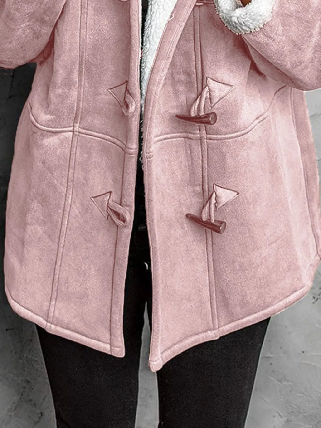 Cozy pink sherpa lined toggle coat with hood in plus size, featuring a soft texture and stylish design.