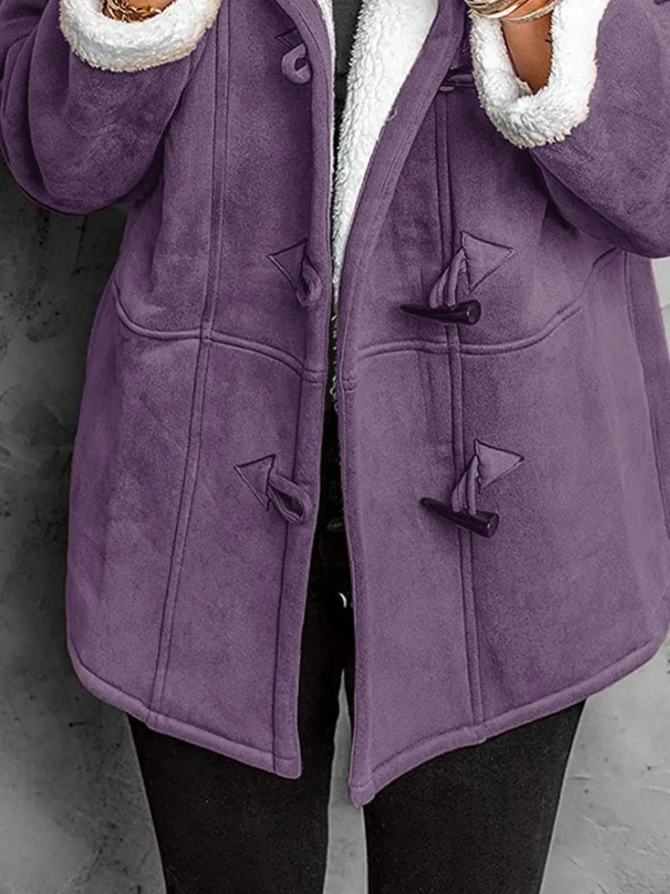 Full size cozy purple sherpa lined toggle coat with hood, featuring front toggle closures and side pockets.
