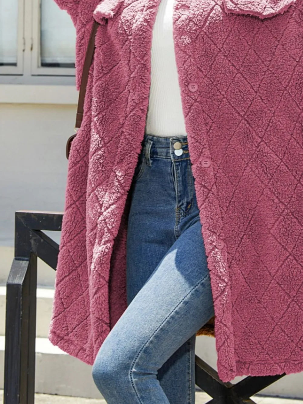 Texture button-up dropped shoulder coat in pink, featuring a cozy, quilted design, paired with jeans.