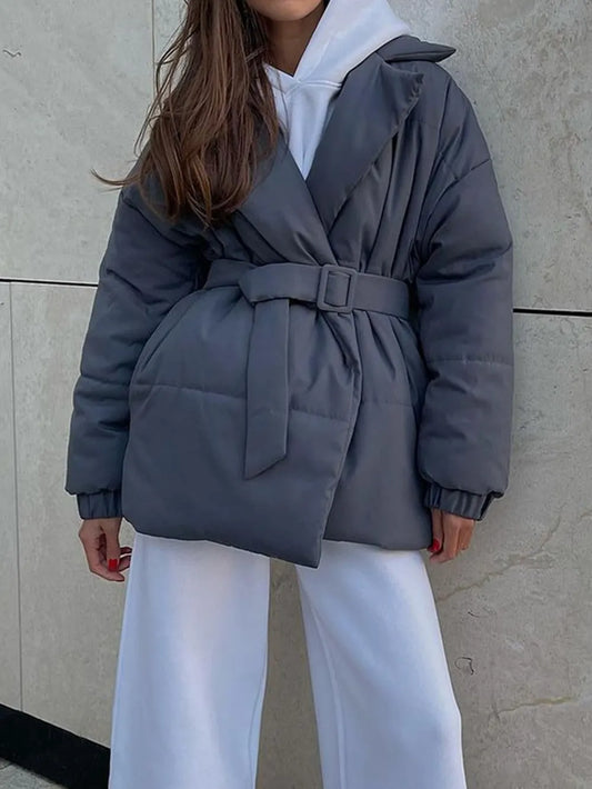 Puffer long sleeve winter coat with belt in gray, featuring a relaxed fit and stylish design.